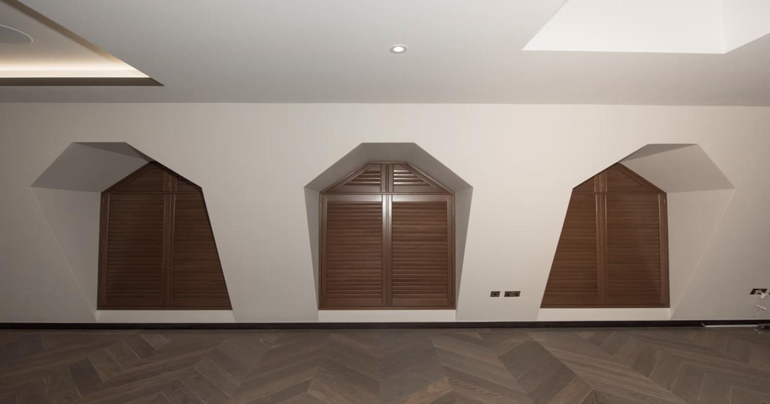 Graino Paulownia shutters angled loft window