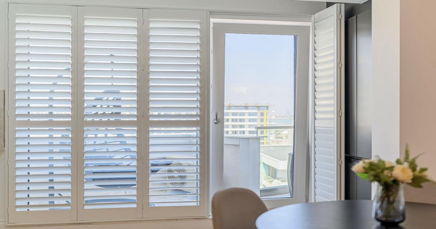 Strato Paulownia shutters balcony door installation