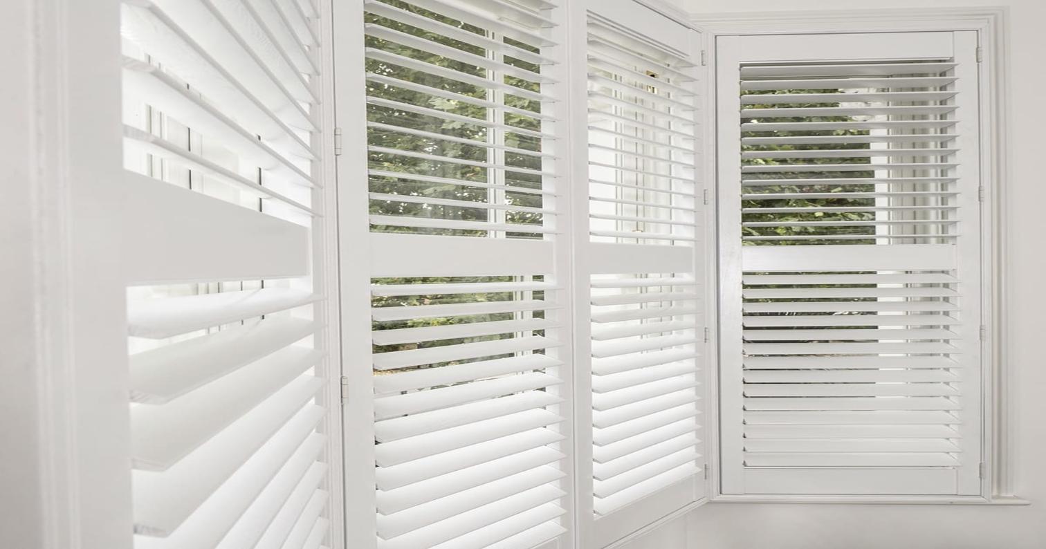 Strato Paulownia shutters angled bay window