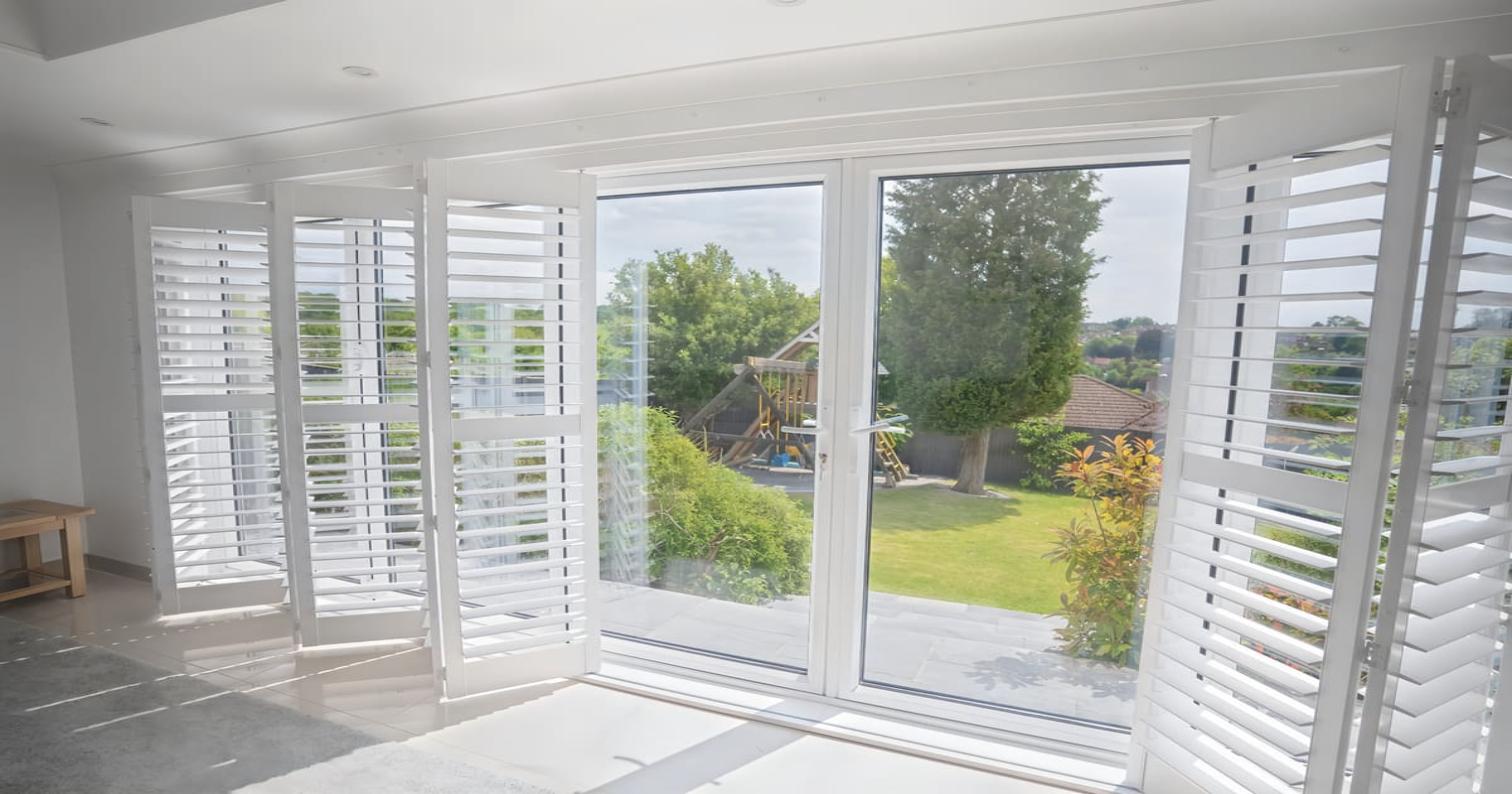 Strato Paulownia shutters bi-fold doors installation